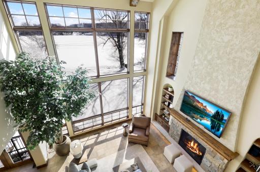 The upper-level hosts the primary ensuite and three additional bedrooms supported by two additional bathrooms, a well-appointed laundry room and a reading nook overlooking the great room.