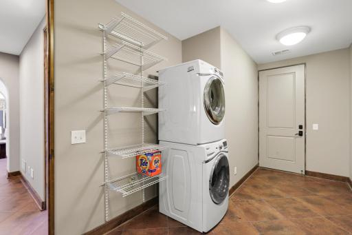 The lake room provides extra pool and lake storage, and has a convenient, 2nd laundry set up.