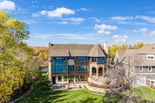 The expansive backyard is flat to the water and provides extensive space for yard games and outdoor activities.