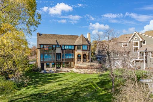 The expansive backyard is flat to the water and provides extensive space for yard games and outdoor activities.