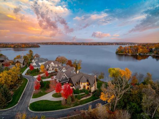 The home is set on a half-acre, walkout lot with a very gentle slope to 133â of sandy, clear, southeast facing shoreline on Smithtown Bay, one of Lake Minnetonkaâs clearest bays.