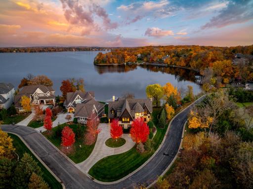 The home is set on a half-acre, walkout lot with a very gentle slope to 133â of sandy, clear, southeast facing shoreline on Smithtown Bay, one of Lake Minnetonkaâs clearest bays.