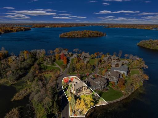 The home is set on a half-acre, walkout lot with a very gentle slope to 133â of sandy, clear, southeast facing shoreline on Smithtown Bay, one of Lake Minnetonkaâs clearest bays.