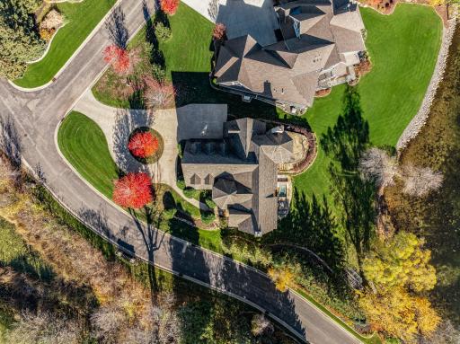 A row of trees along the southwest property line boosts backyard privacy.