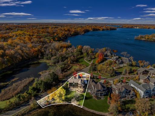 The home is set on a half-acre, walkout lot with a very gentle slope to 133â of sandy, clear, southeast facing shoreline on Smithtown Bay, one of Lake Minnetonkaâs clearest bays.