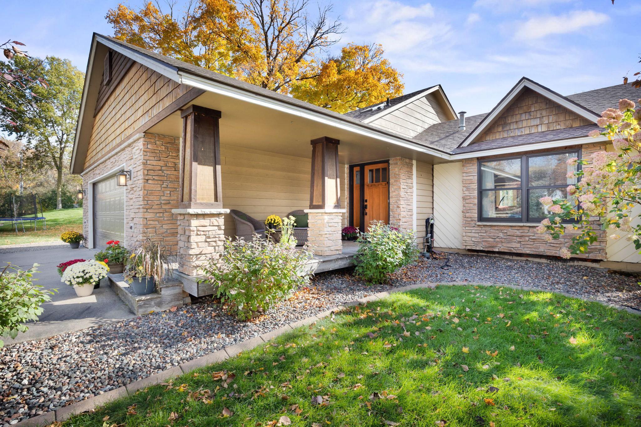 The covered front porch is so charming!