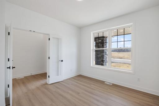 This office is sequestered from the main level living facilities, making it perfect for at home work.