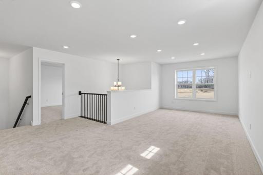 Centrally located on the second floor, the loft adds shared living space that could be a space for movies and games, as itâs configured here.