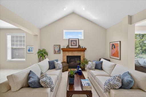 Photo for 18624 48th Avenue N, Minneapolis, MN 55446 - listing #6810736 Main floor vaulted living room with gas fireplace.