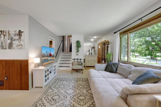 Welcome to YOUR new home located at 6920 35th St. N in Oakdale.