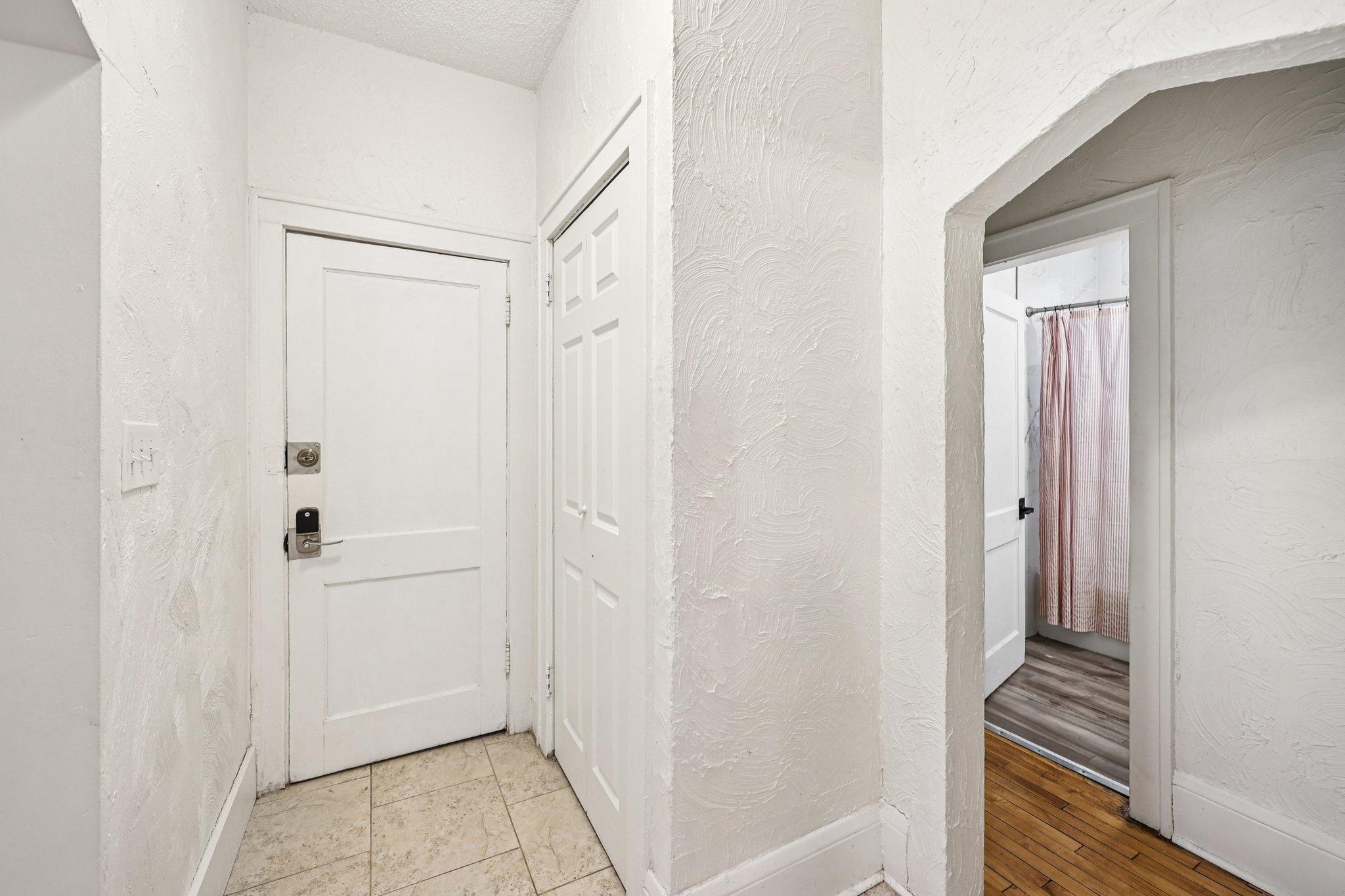 Back door leading to upstairs or downstairs