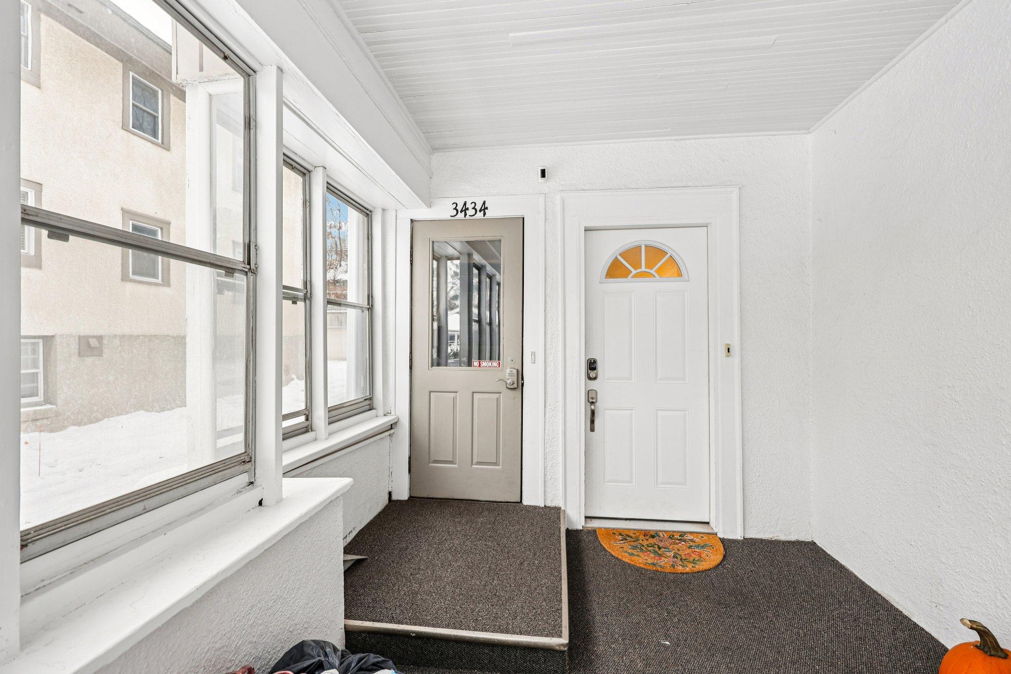 Right door to the main level, left door to the upstairs unit