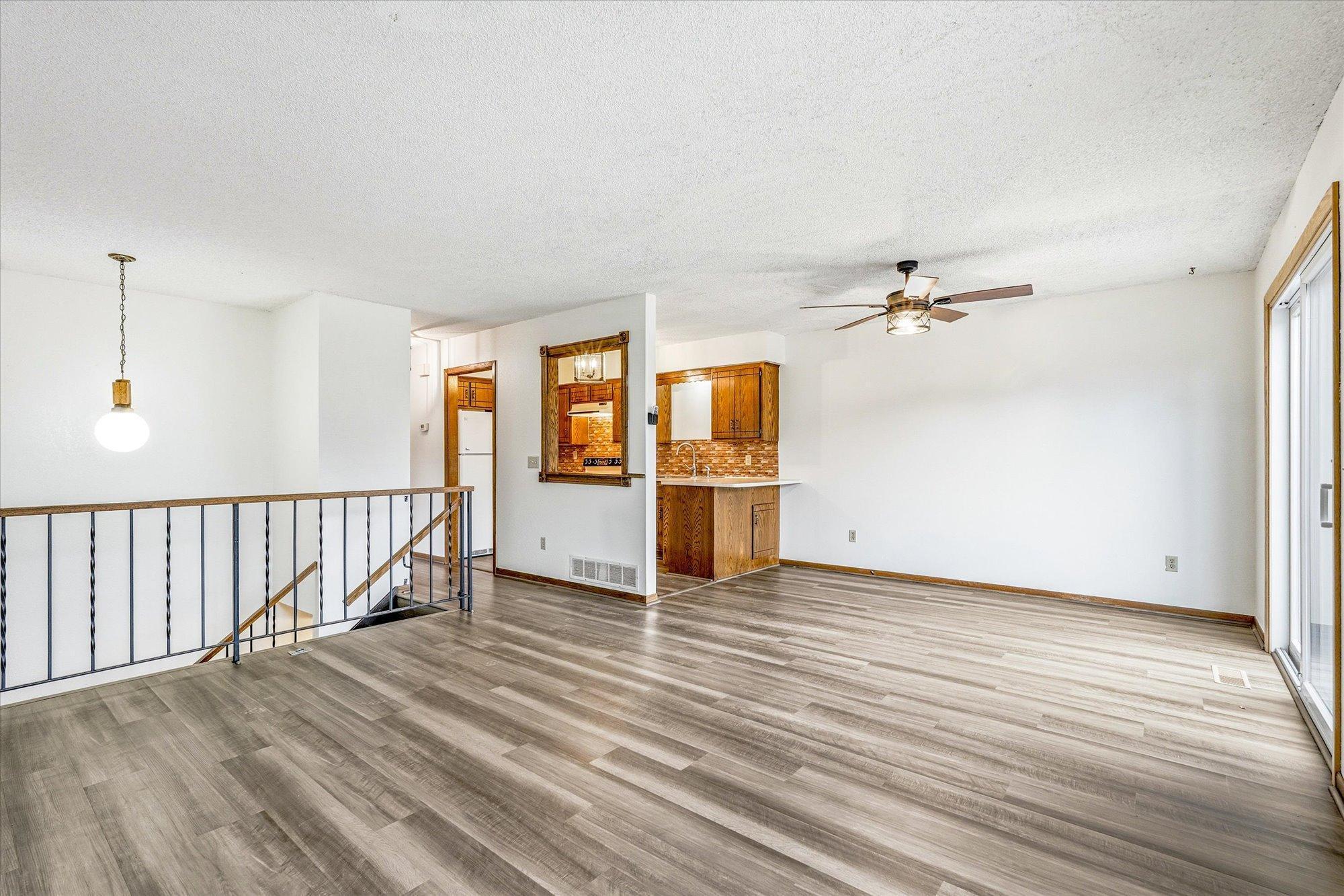 Spacious upper level features new LVP floors thorughout