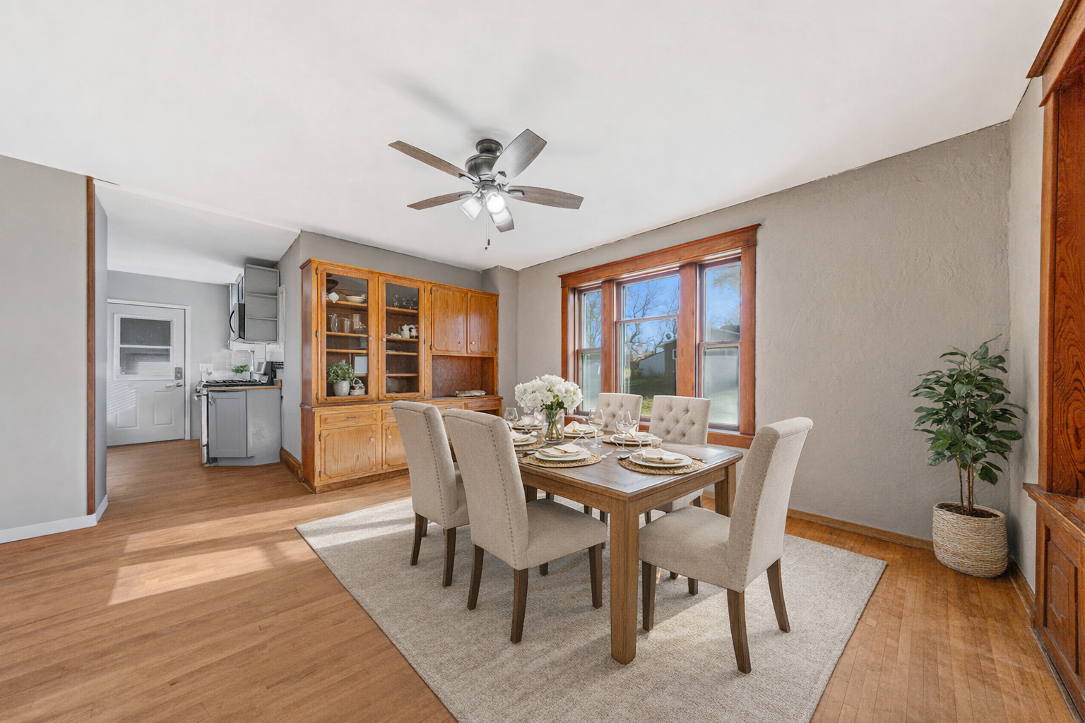 This photo is virtually staged. Spacious formal dining room w/built-in buffet