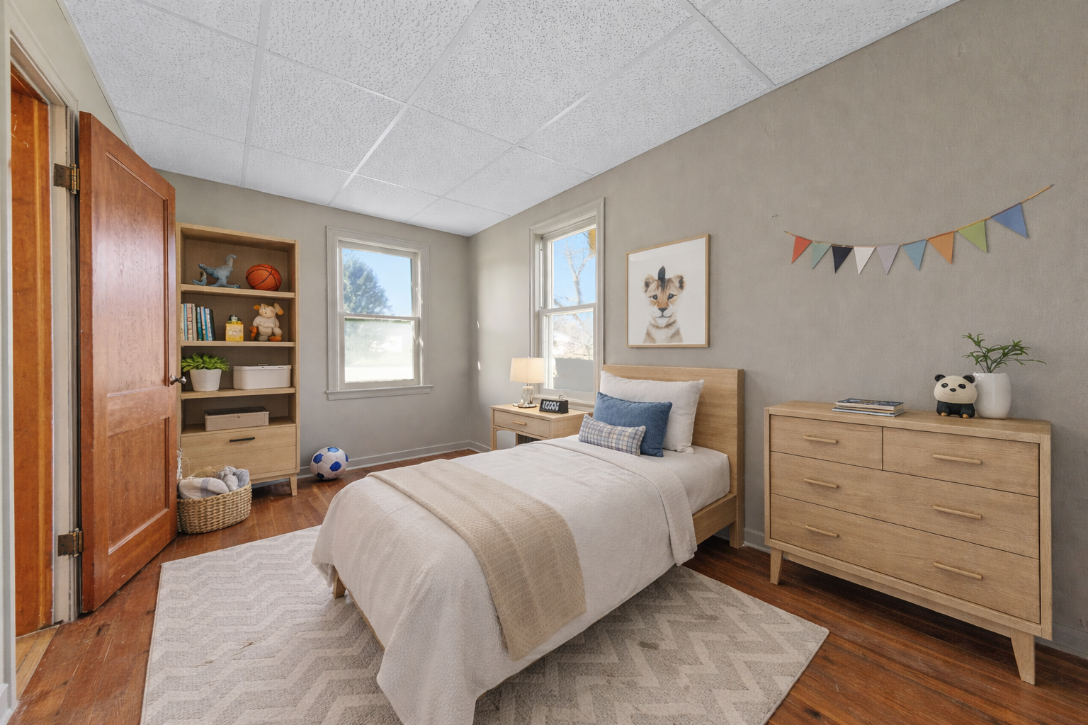 Cozy and charming bedroom off the living area on Main Level...virtually staged.