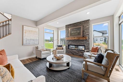 Gorgeous fireplace with windows on each side