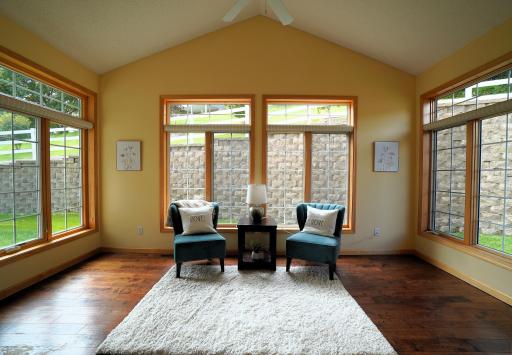 Welcome Home! This beautiful Twin Home is on a quiet cul de sac! Spacious & open floor plan, vaulted ceilings, transom windows, lots of privacy & great space for entertaining! Enjoy your cup of coffee or favorite book in this amazing sunroom!