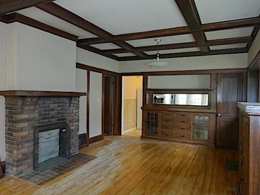 Natural woodwork, hardwood floors and built-ins are hallmarks of Arts & Crafts Bungalows. This home on Hillside has all of those and is waiting for some tender loving care from a new owner.