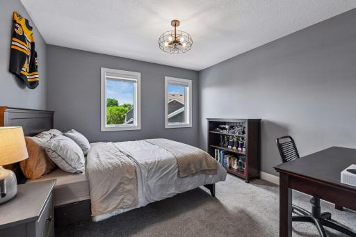The fourth bedroom, light-filled with a walk-in closet of its own.