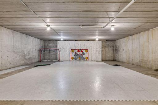1000sq ft spancrete rounds out the lower level. Currently being used as a hockey rink