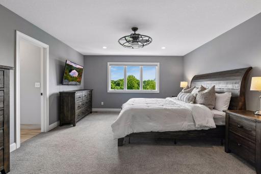 Upstairs you will find double door entrance to spacious primary suite