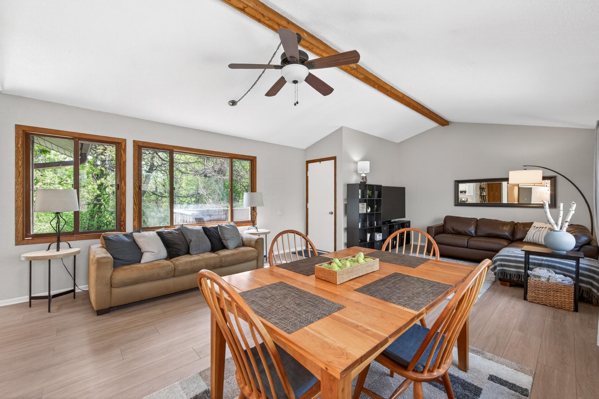 Layout flows from dining room to living room