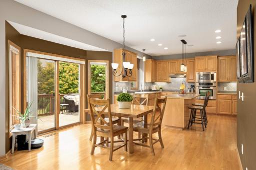 The adjoining kitchen/dining area have hardwood floors throughout.