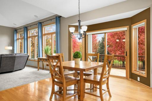 The informal dining area provides access to the deck, making it ideal for entertaining.