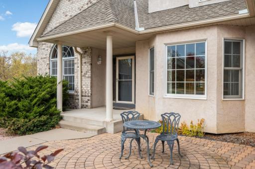 Enjoy a cup of coffee on your front paver patio!