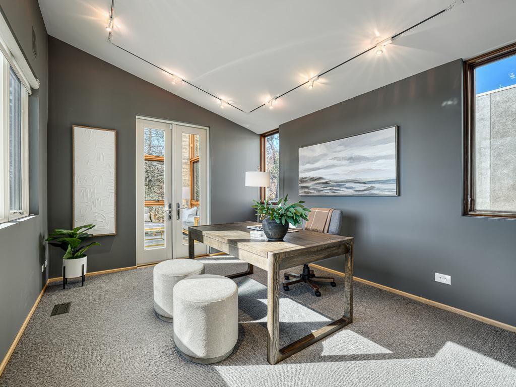 The den offers a perfect work from home space!