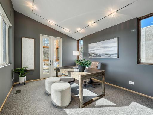 The den offers a perfect work from home space!