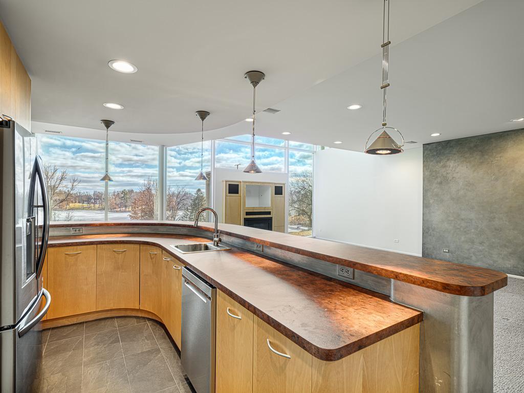 The empty closet in the wet bar area is a perfect space to create a wine cellar or use for extra storage.