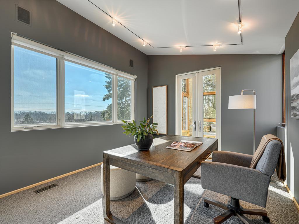 Office retreat with serene lakefront views