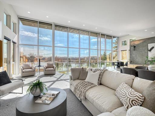 Expansive walls of glass frame breathtaking views of Sunfish Lake