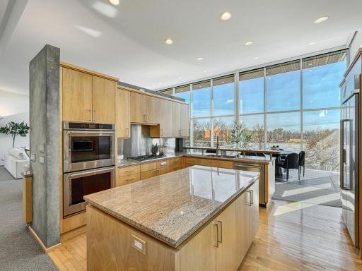 Well-appointed kitchen with stainless steel appliances and dual ovens