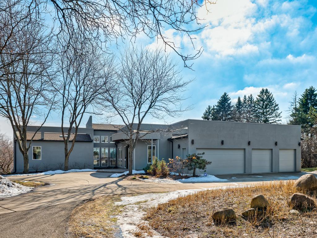 A heated four-car garage provides comfort and convenience year-round