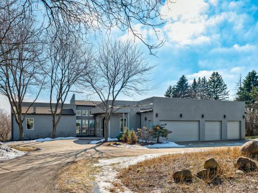 A heated four-car garage provides comfort and convenience year-round