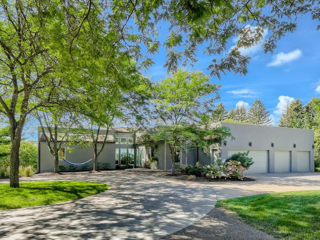 A heated four-car garage provides comfort and convenience year-round