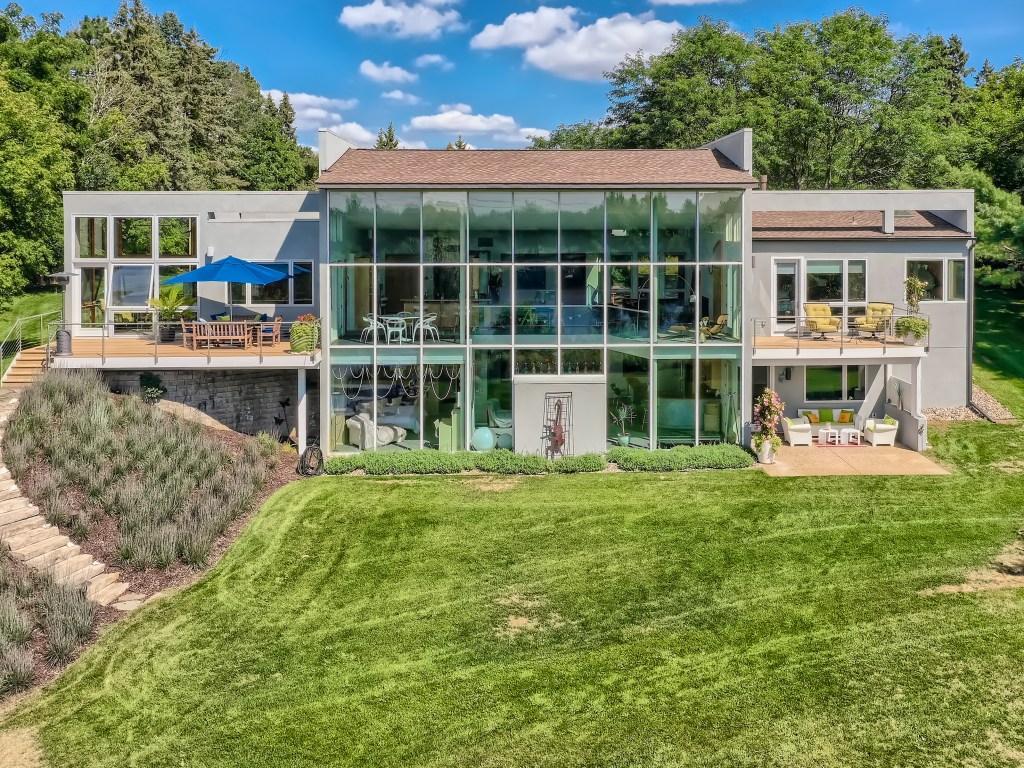 Updated home exterior with meticulous improvements, including new roofs...