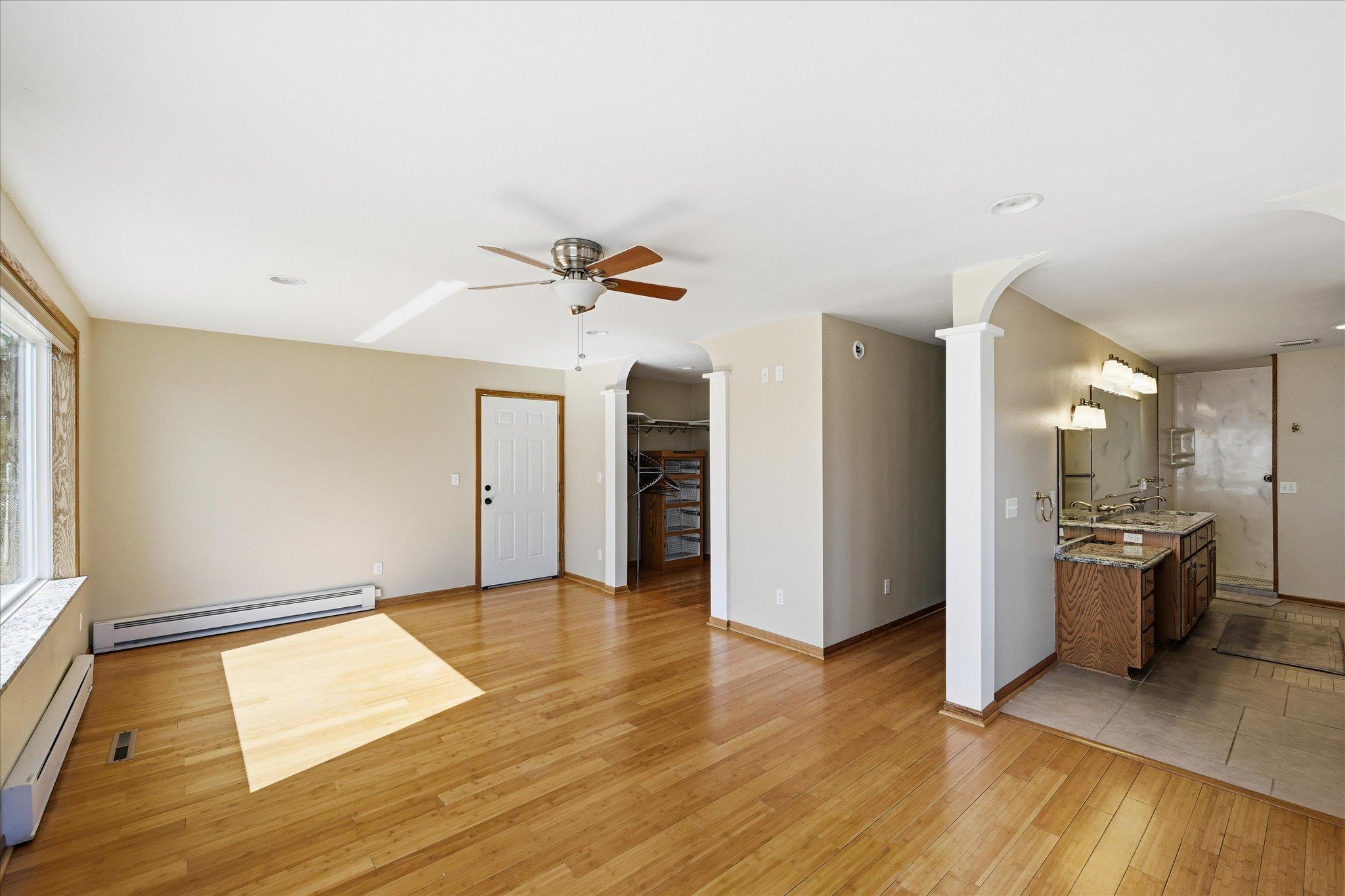 Primary bedroom with access to the backyard