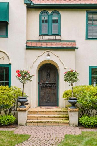 Beautiful arched doorway - signature feature of the Spanish Revival architecture style.