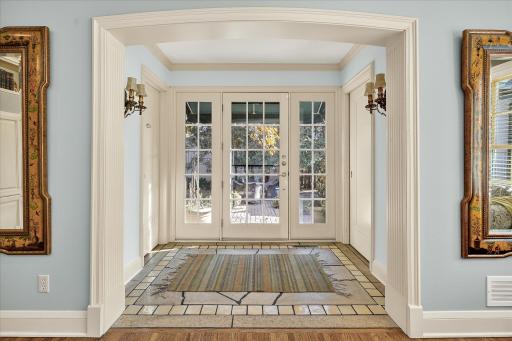 Entry space perfectly located between 1/2 bath an huge closet.