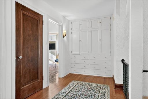2nd floor hallway has large built-in linen closet.