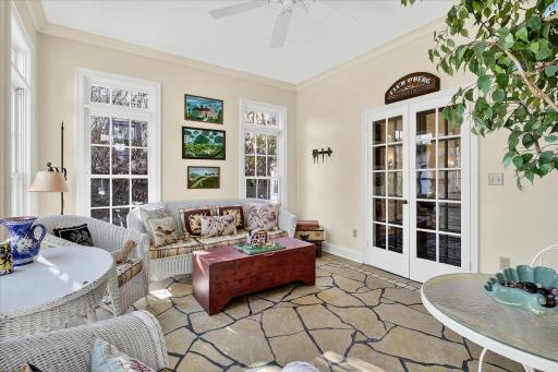 Sun filled 3-season porch provides a quiet, private space for morning coffee or evening glass of wine.