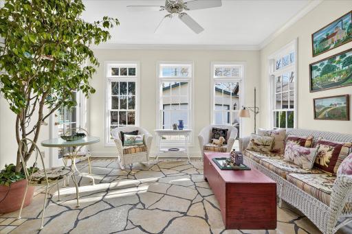 Sun filled 3-season porch provides a quiet, private space for morning coffee or evening glass of wine.