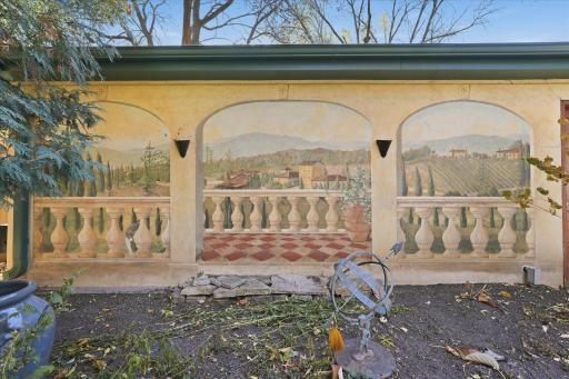 Custom "Tuscan" image was painted the on garage by Michael Bolin (1947-2012), a highly talented artist most famous for painting the 8th floor auditorium shows for Dayton’s.