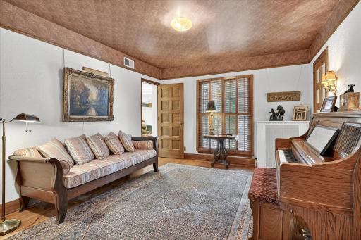 Music room (sitting room) is perfectly located between foyer and kitchen. It could also be a great playroom for young kids.