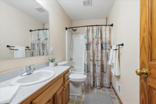 Full Bath on Main - with pass-through to Primary Bedroom