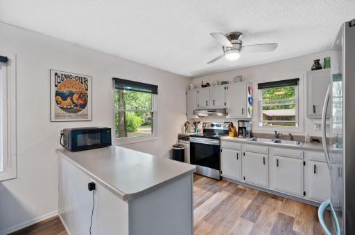 Photo for 13348 Linwood Forest Circle, Champlin, MN 55316 - listing #6812478 Enjoy plenty of cabinet, countertop and cupboard space with lots of natural light gleaming through the windows.