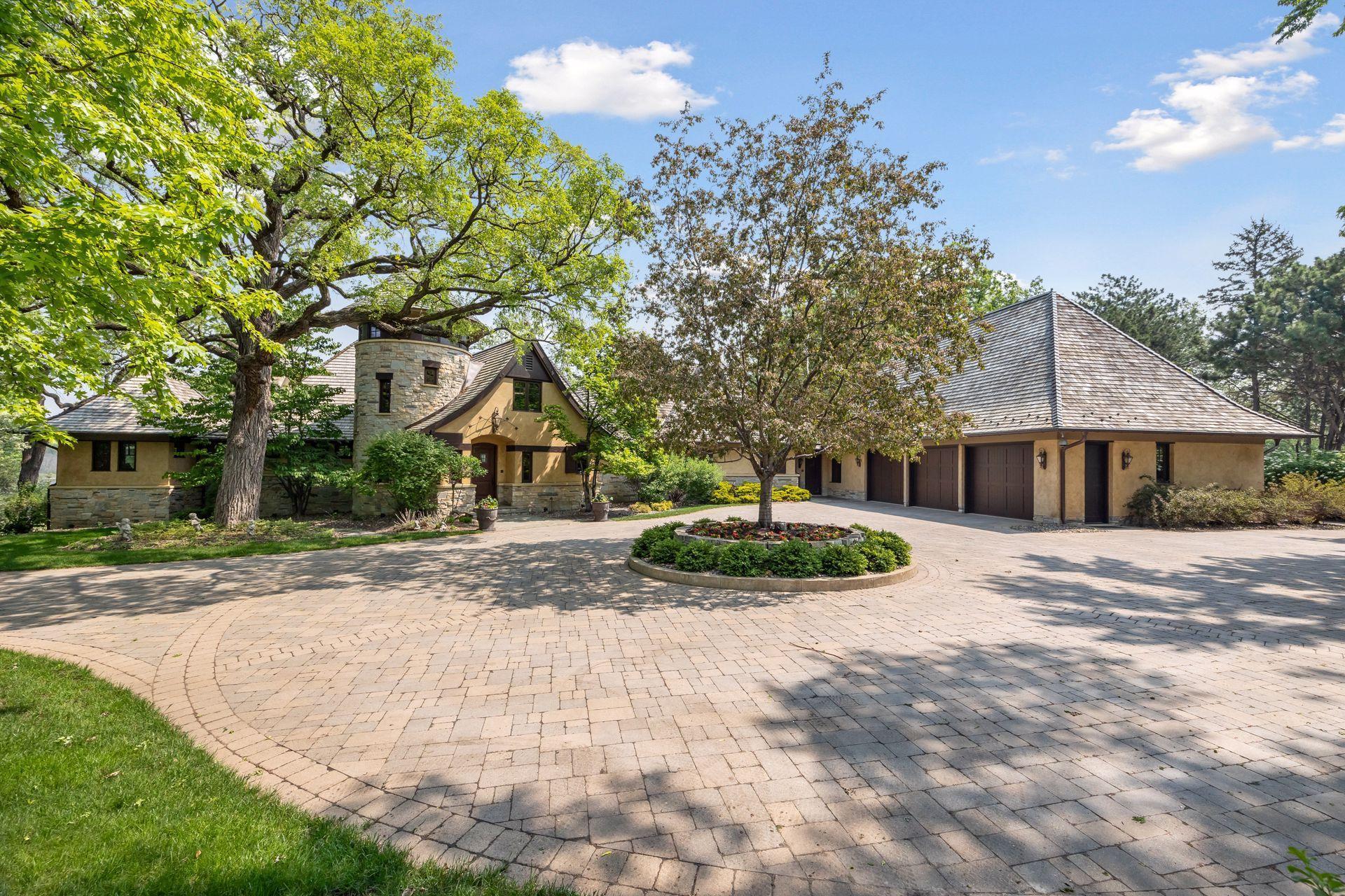 Beautiful curb appeal and impressive architectural detail from the moment you drive up to the property